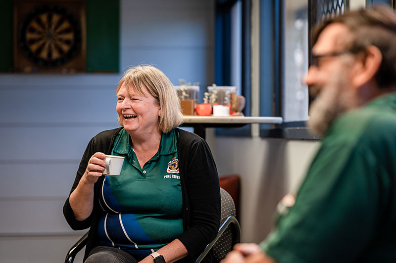 Woman drinking a cup of tea at Pine Rivers RSL Sub Branch