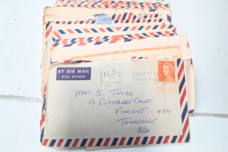 Letters sent to Sandra from David in Vietnam laid out on a table