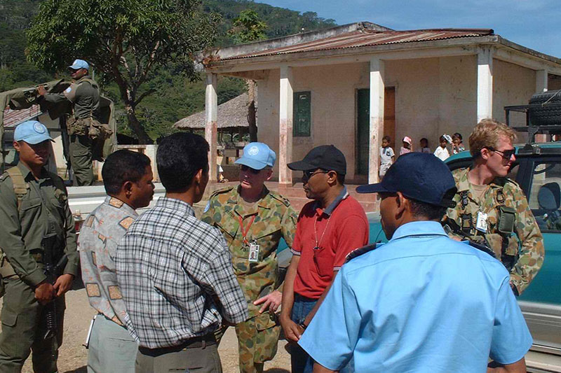 INTERFET officials meeting with locals in Bazartete, East Timor