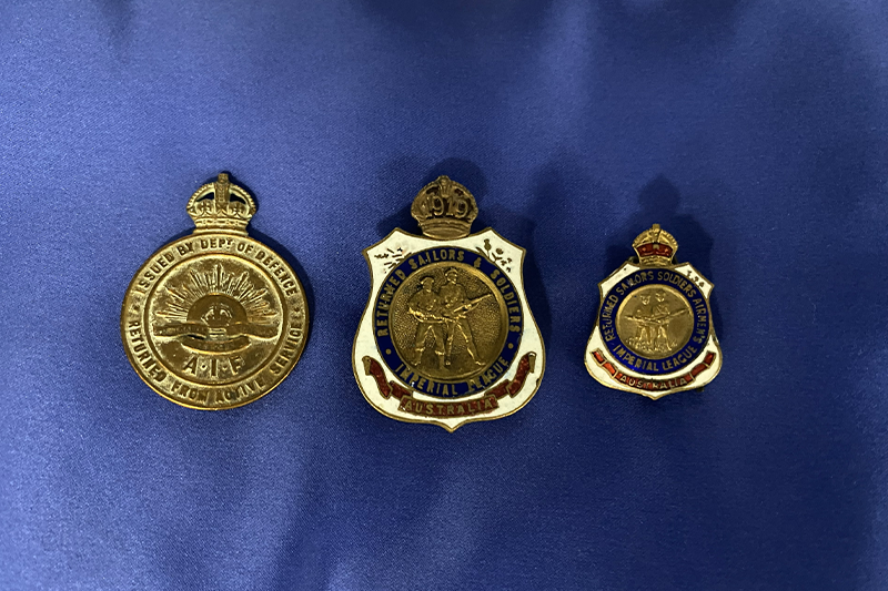 From left to right, the Returned from Active Service Badge, RSSILA Badge with 1919 financial clip attached and the RSSILA Miniature Badge (Source: RSL Queensland Papers).    