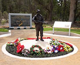 Person sitting at a table talking with others